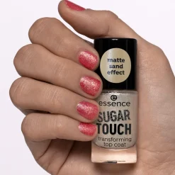 Top- En Basecoat^essence SUGAR TOUCH transformerende topcoat -
